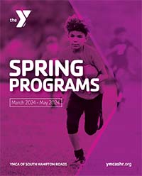 program guide cover with image of youth football players
